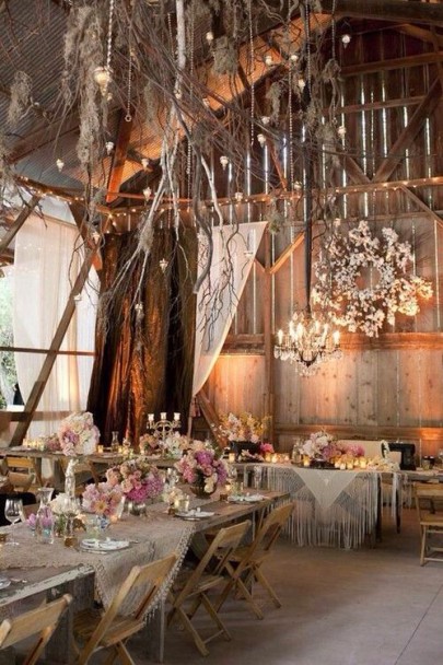 Country chic wedding decor at indoor rustic barn