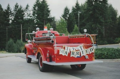 Red fire engine "Just Married" wedding exit via Green Wedding Shoes